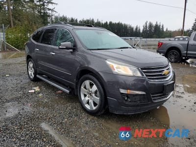 Czwarte zdjęcie samochodu z boku: 2015 CHEVROLET TRAVERSE LTZ VIN:1GNKVJKD1FJ310197 - miniatura