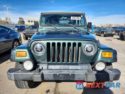 Piąte zdjęcie samochodu w środku: 2002 JEEP WRANGLER / TJ SPORT VIN:1J4FA49S32P731769 - miniatura