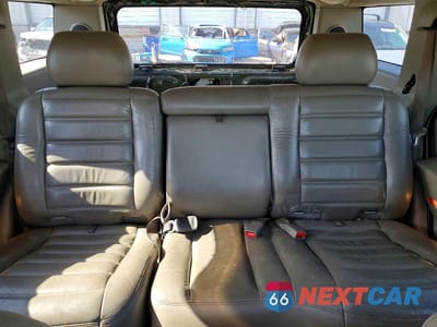 Zdjęcie 10 z 13 samochodu: 2003 HUMMER H2 VIN:5GRGN23U43H107700 - miniatura