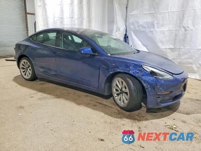 Czwarte zdjęcie samochodu z boku: 2022 TESLA MODEL 3 VIN:5YJ3E1EA0NF189005 - miniatura