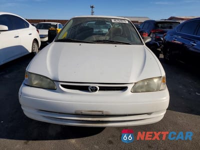 Piąte zdjęcie samochodu w środku: 2000 TOYOTA COROLLA VE VIN:1NXBR12E2YZ346239 - miniatura