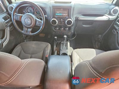 Zdjęcie 8 z 12 samochodu: 2015 JEEP WRANGLER UNLIMITED SAHARA VIN:1C4BJWEG9FL547435 - miniatura