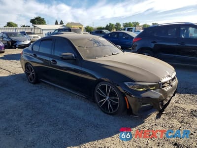 Czwarte zdjęcie samochodu z boku: 2019 BMW 330I VIN:WBA5R1C51KAK06611 - miniatura