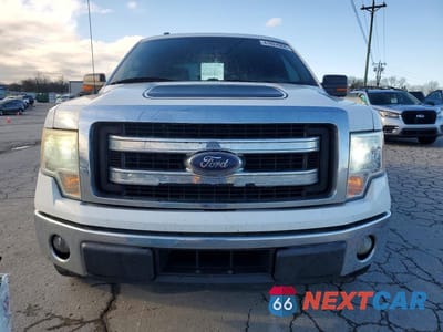 Piąte zdjęcie samochodu w środku: 2014 FORD F150 SUPERCREW VIN:1FTFW1CT0EFC95545 - miniatura