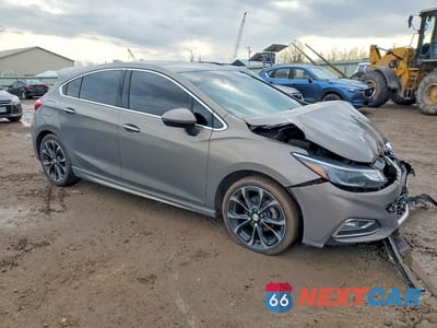 Czwarte zdjęcie samochodu z boku: 2017 CHEVROLET CRUZE PREMIER VIN:3G1BF6SM2HS532759 - miniatura