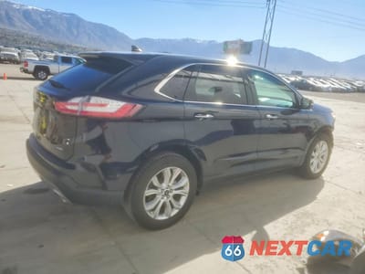 Trzecie zdjęcie samochodu z tyłu: 2022 FORD EDGE VIN:2FMPK4K97NBA30982 - miniatura