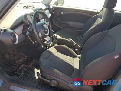 Zdjęcie 7 z 13 samochodu: 2009 MINI COOPER VIN:WMWMF33579TU70382 - miniatura