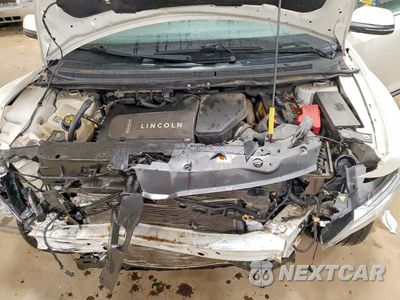 Zdjęcie 12 z 13 samochodu: 2013 LINCOLN MKX VIN:2LMDJ8JK0DBL20744 - miniatura