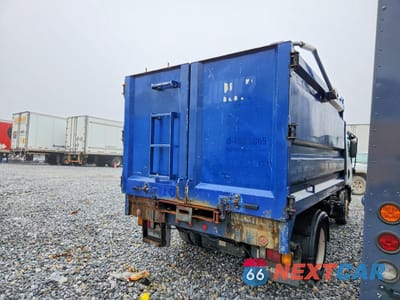 Trzecie zdjęcie samochodu z tyłu: 2015 ISUZU NPR HD DUMP TRUCK VIN:54DC4W1B1FS805261 - miniatura