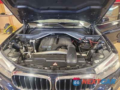 Zdjęcie 12 z 12 samochodu: 2014 BMW X5 XDRIVE35I VIN:5UXKR0C53E0K51669 - miniatura