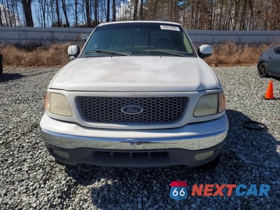 Piąte zdjęcie samochodu w środku: 1999 FORD F-150 VIN:2FTRX08L3XCA87784 - miniatura