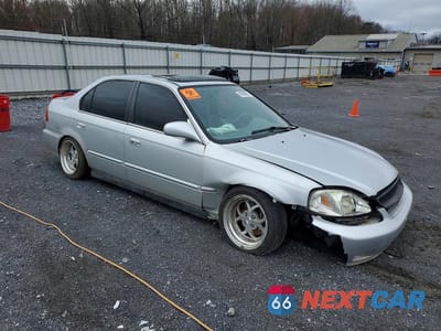 Czwarte zdjęcie samochodu z boku: 1999 HONDA CIVIC EX VIN:1HGEJ8544XL037799 - miniatura
