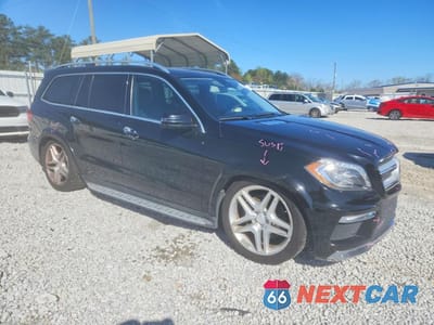 Czwarte zdjęcie samochodu z boku: 2015 MERCEDES-BENZ GL 550 4MATIC VIN:4JGDF7DE5FA444357 - miniatura