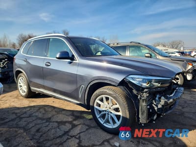 Czwarte zdjęcie samochodu z boku: 2022 BMW X5 XDRIVE40I VIN:5UXCR6C00N9L38226 - miniatura