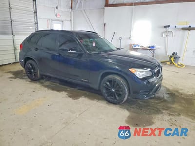 Czwarte zdjęcie samochodu z boku: 2015 BMW X1 XDRIVE28I VIN:WBAVL1C57FVY29229 - miniatura