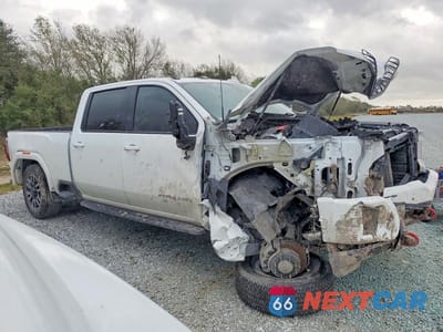 Czwarte zdjęcie samochodu z boku: 2022 GMC SIERRA K2500 AT4 VIN:1GT49PE71NF148734 - miniatura