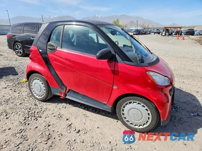 Czwarte zdjęcie samochodu z boku: 2014 SMART FORTWO PURE VIN:WMEEJ3BA2EK757330 - miniatura