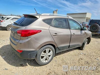 Trzecie zdjęcie samochodu z tyłu: 2011 HYUNDAI TUCSON VIN:KM8JUCAC3BU201577 - miniatura