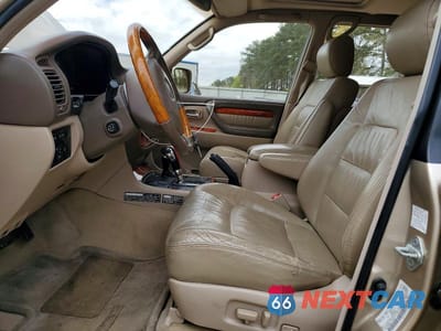 Zdjęcie 7 z 13 samochodu: 2001 LEXUS LX 470 BASE VIN:JTJHT00W213501936 - miniatura