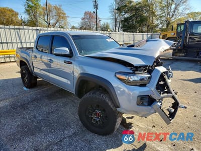 Czwarte zdjęcie samochodu z boku: 2017 TOYOTA TACOMA TRD PRO VIN:5TFCZ5AN5HX073149 - miniatura