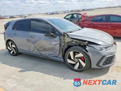 Czwarte zdjęcie samochodu z boku: 2022 VOLKSWAGEN GOLF GTI VIN:WVWG87CD1NW161329 - miniatura