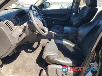 Zdjęcie 7 z 12 samochodu: 2010 JEEP GRAND CHEROKEE SRT-8 VIN:1J4RR7GW3AC105674 - miniatura