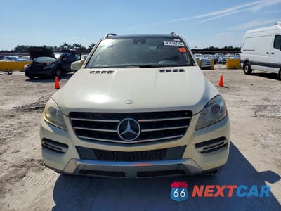Piąte zdjęcie samochodu w środku: 2013 MERCEDES-BENZ ML 350 4MATIC VIN:4JGDA5HB9DA196114 - miniatura