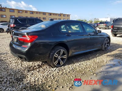 Trzecie zdjęcie samochodu z tyłu: 2018 BMW 750 XI VIN:WBA7F2C57JG423745 - miniatura