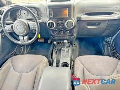 Zdjęcie 9 z 10 samochodu: 2014 JEEP WRANGLER UNLIMITED SAHARA VIN:1C4BJWEG1EL304085 - miniatura