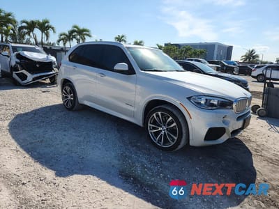 Czwarte zdjęcie samochodu z boku: 2016 BMW X5 XDR40E VIN:5UXKT0C54G0S77959 - miniatura