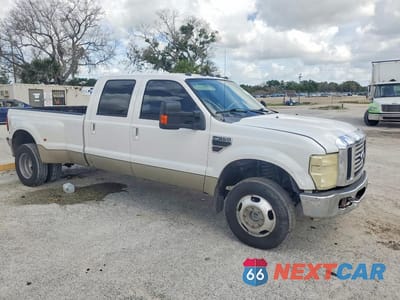 Czwarte zdjęcie samochodu z boku: 2010 FORD F350 SUPER DUTY VIN:1FTWW3DR5AEA50593 - miniatura