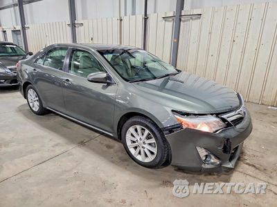 Czwarte zdjęcie samochodu z boku: 2014 TOYOTA CAMRY HYBRID XLE VIN:4T1BD1FK0EU100509 - miniatura