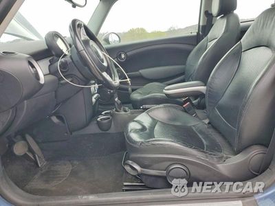 Zdjęcie 7 z 12 samochodu: 2010 MINI COOPER VIN:WMWMF3C57ATZ67081 - miniatura