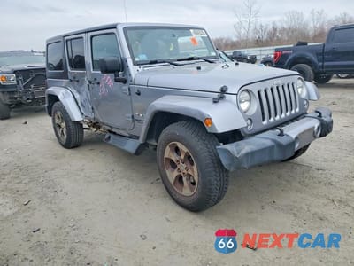 Czwarte zdjęcie samochodu z boku: 2017 JEEP WRANGLER UNLIMITED SAHARA VIN:1C4BJWEG3HL747651 - miniatura