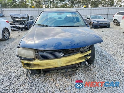 Piąte zdjęcie samochodu w środku: 1996 MAZDA PROTEGE DX VIN:JM1BB1415T0327980 - miniatura