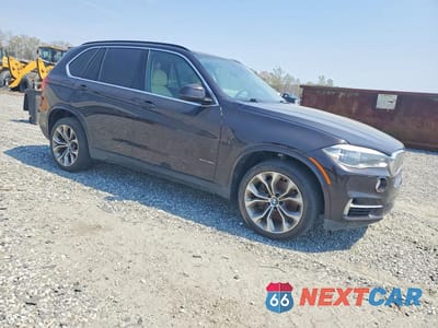Czwarte zdjęcie samochodu z boku: 2014 BMW X5 XDRIVE50I VIN:5UXKR6C5XE0J73619 - miniatura