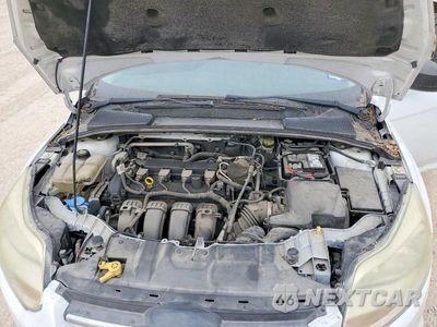 Zdjęcie 11 z 11 samochodu: 2014 FORD FOCUS S VIN:1FADP3E25EL410264 - miniatura