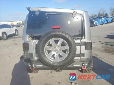 Zdjęcie 6 z 13 samochodu: 2013 JEEP WRANGLER UNLIMITED SAHARA VIN:1C4BJWEGXDL609924 - miniatura