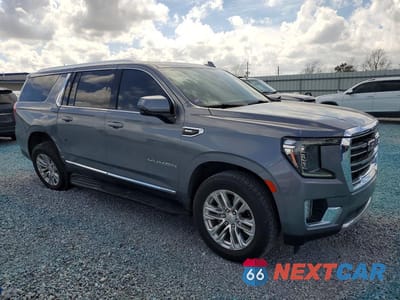 Czwarte zdjęcie samochodu z boku: 2022 GMC YUKON XL C1500 SLT VIN:1GKS1GKDXNR172901 - miniatura