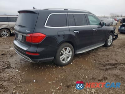 Trzecie zdjęcie samochodu z tyłu: 2013 MERCEDES-BENZ GL 450 4MATIC VIN:4JGDF7CE7DA256745 - miniatura