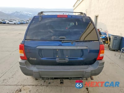 Zdjęcie 6 z 11 samochodu: 2001 JEEP GRAND CHEROKEE LAREDO VIN:1J4GW48S61C590371 - miniatura