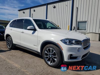 Czwarte zdjęcie samochodu z boku: 2017 BMW X5 SDRIVE35I VIN:5UXKR2C39H0W43697 - miniatura