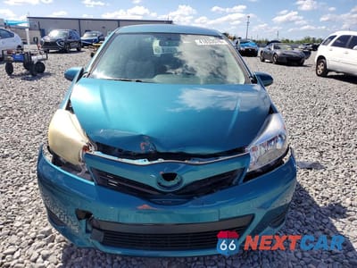 Piąte zdjęcie samochodu w środku: 2012 TOYOTA YARIS 3-DOOR L VIN:JTDJTUD37CD509264 - miniatura