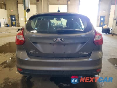 Zdjęcie 6 z 11 samochodu: 2013 FORD FOCUS TITANIUM VIN:1FADP3N23DL277115 - miniatura