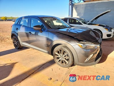 Czwarte zdjęcie samochodu z boku: 2016 MAZDA CX-3 GRAND TOURING VIN:JM1DKBD76G0111645 - miniatura