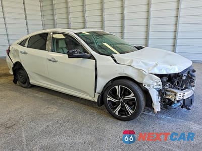 Czwarte zdjęcie samochodu z boku: 2016 HONDA CIVIC TOURING VIN:19XFC1F91GE201484 - miniatura