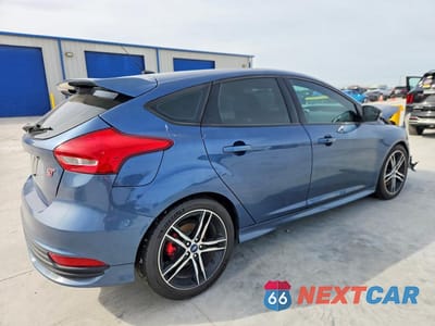 Trzecie zdjęcie samochodu z tyłu: 2018 FORD FOCUS VIN:1FADP3L90JL289752 - miniatura