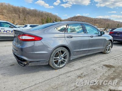 Trzecie zdjęcie samochodu z tyłu: 2014 FORD FUSION TITANIUM VIN:3FA6P0K9XER351982 - miniatura