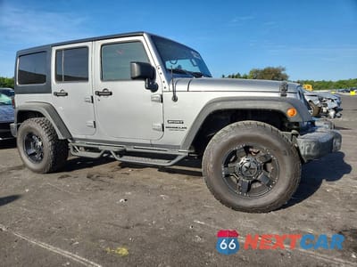 Czwarte zdjęcie samochodu z boku: 2016 JEEP WRANGLER UNLIMITED SPORT VIN:1C4BJWDG1GL139708 - miniatura
