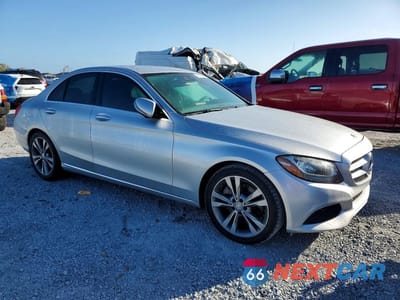 Czwarte zdjęcie samochodu z boku: 2016 MERCEDES-BENZ C 300 VIN:55SWF4JB8GU132000 - miniatura